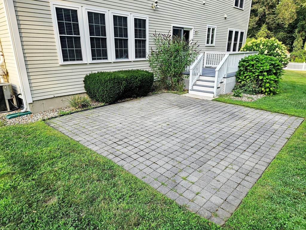 11 Bunting Way Danvers, MA 01923 - Photo 34 of 42 a front view of a house with a yard