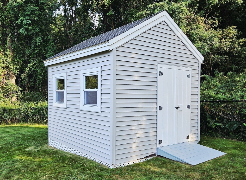 11 Bunting Way Danvers, MA 01923 - Photo 36 of 42 a view of a house with a yard