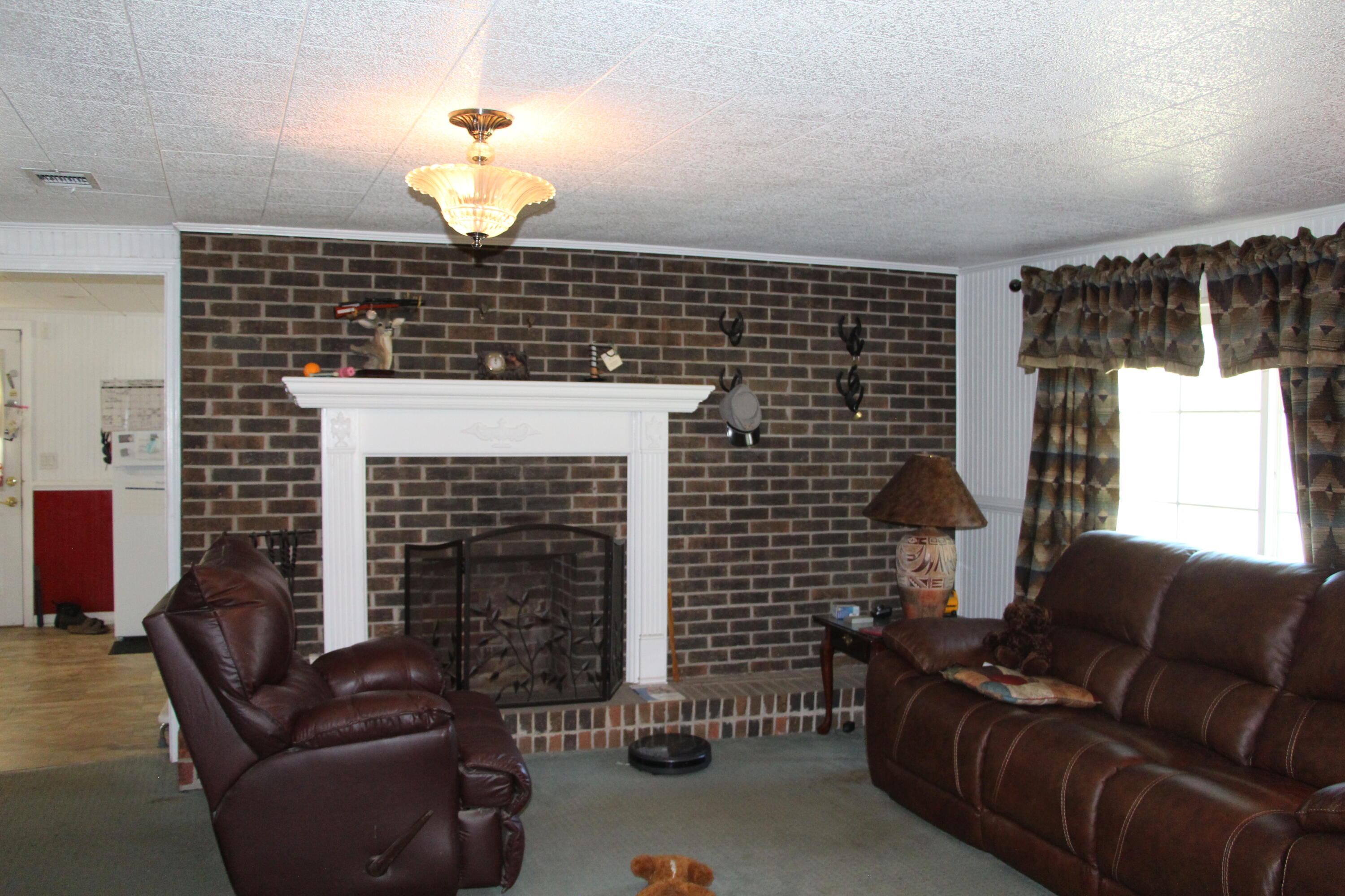 138 Schofield Road DeFuniak Springs, FL 32433 - Photo 19 of 31 living room fireplace