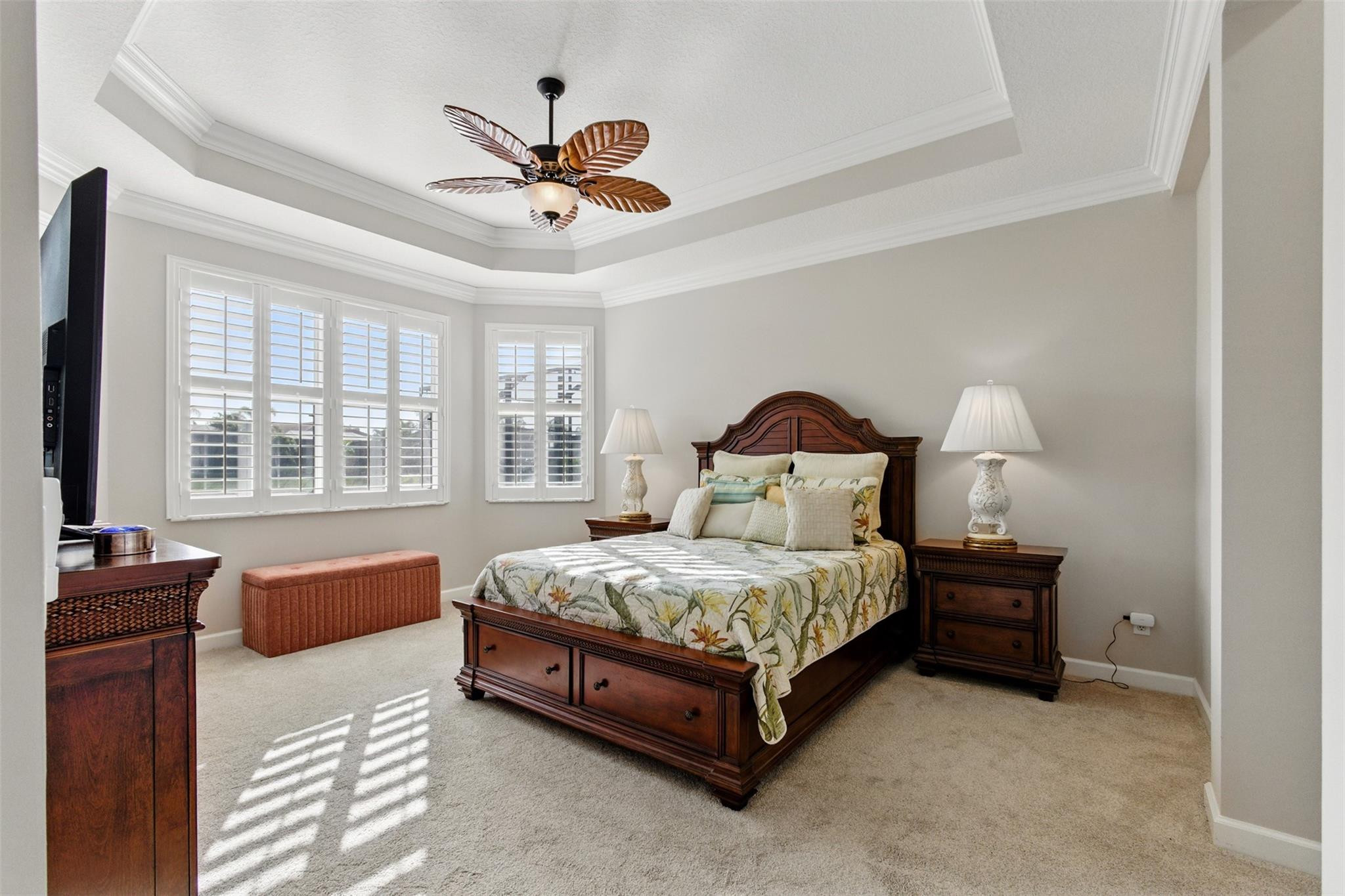 8836 First Tee Road Port St. Lucie, FL 34986 - Photo 13 of 35 a bedroom with a bed and window