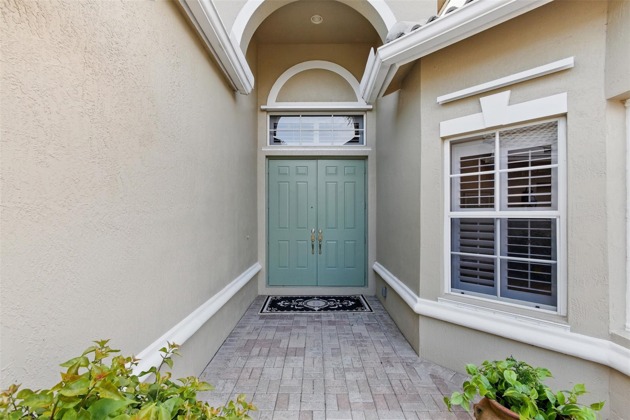 8836 First Tee Road Port St. Lucie, FL 34986 - Photo 2 of 35 a view of entrance door of the house