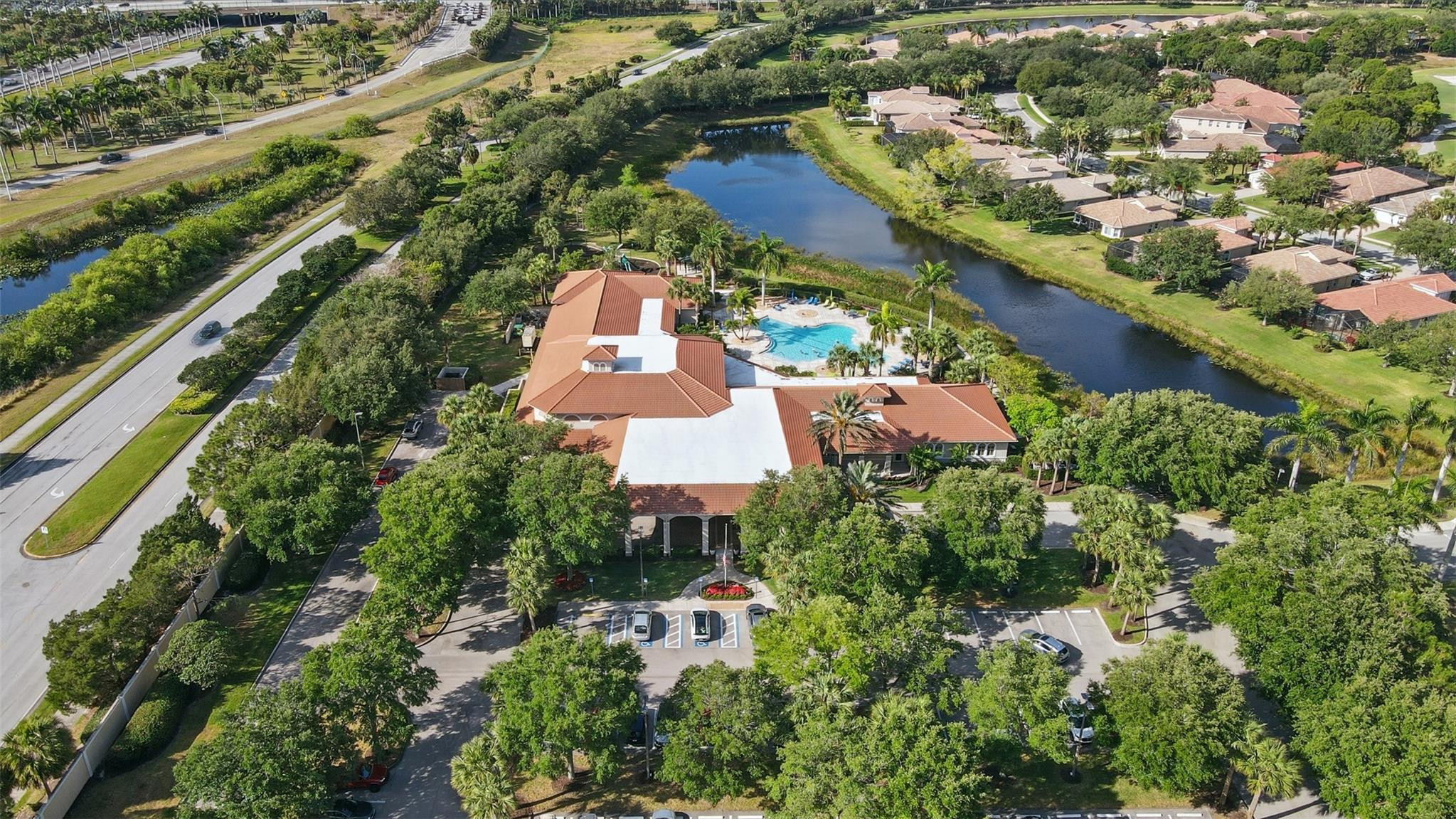 8836 First Tee Road Port St. Lucie, FL 34986 - Photo 33 of 35 an aerial view of house with yard