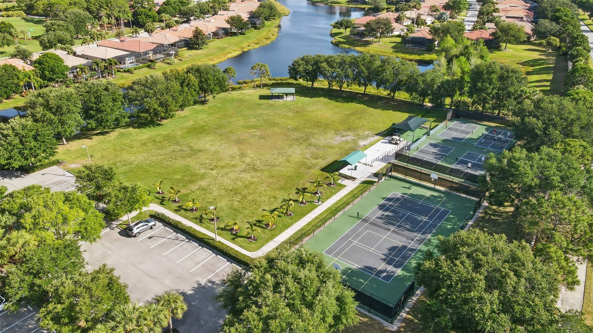 8836 First Tee Road Port St. Lucie, FL 34986 - Photo 34 of 35 an aerial view of residential houses with outdoor space