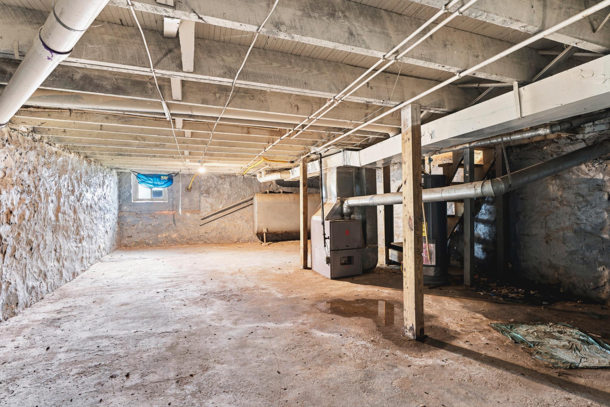 730 Linnard Street Baltimore, MD 21229 - Photo 29 of 31 Spacious, unfinished basement.
