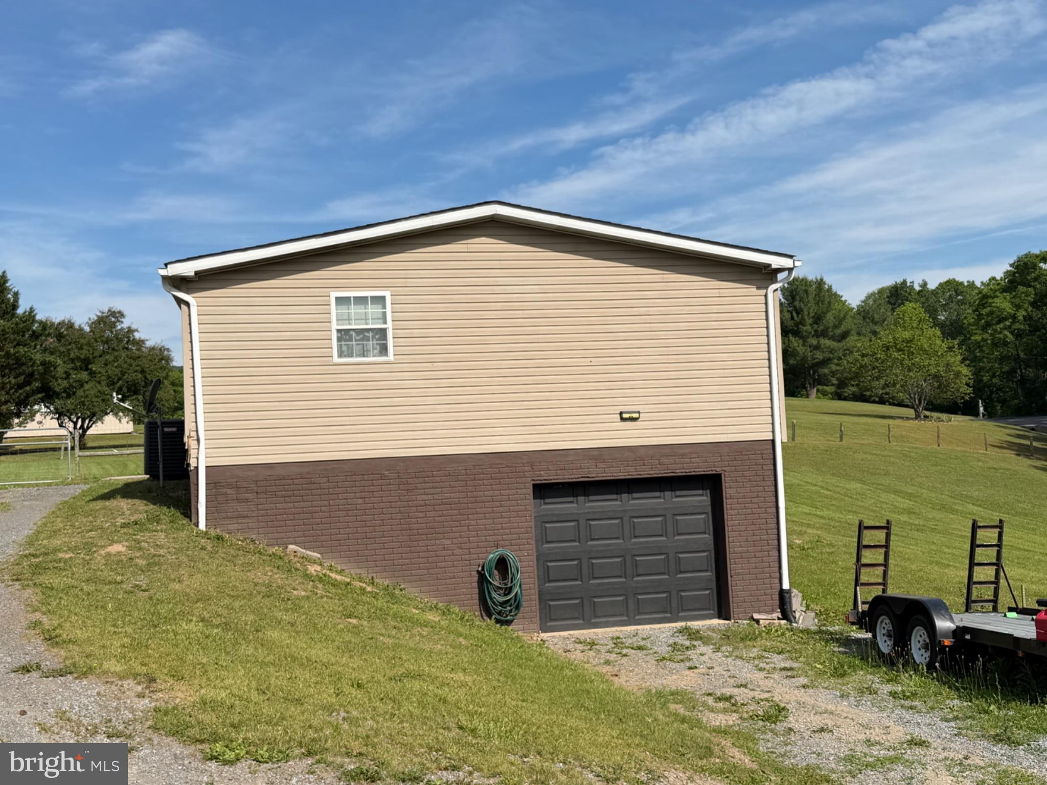 1898 Sawmill Road Hedgesville, WV 25427 - Photo 5 of 6 Charming hillside residence with garage.