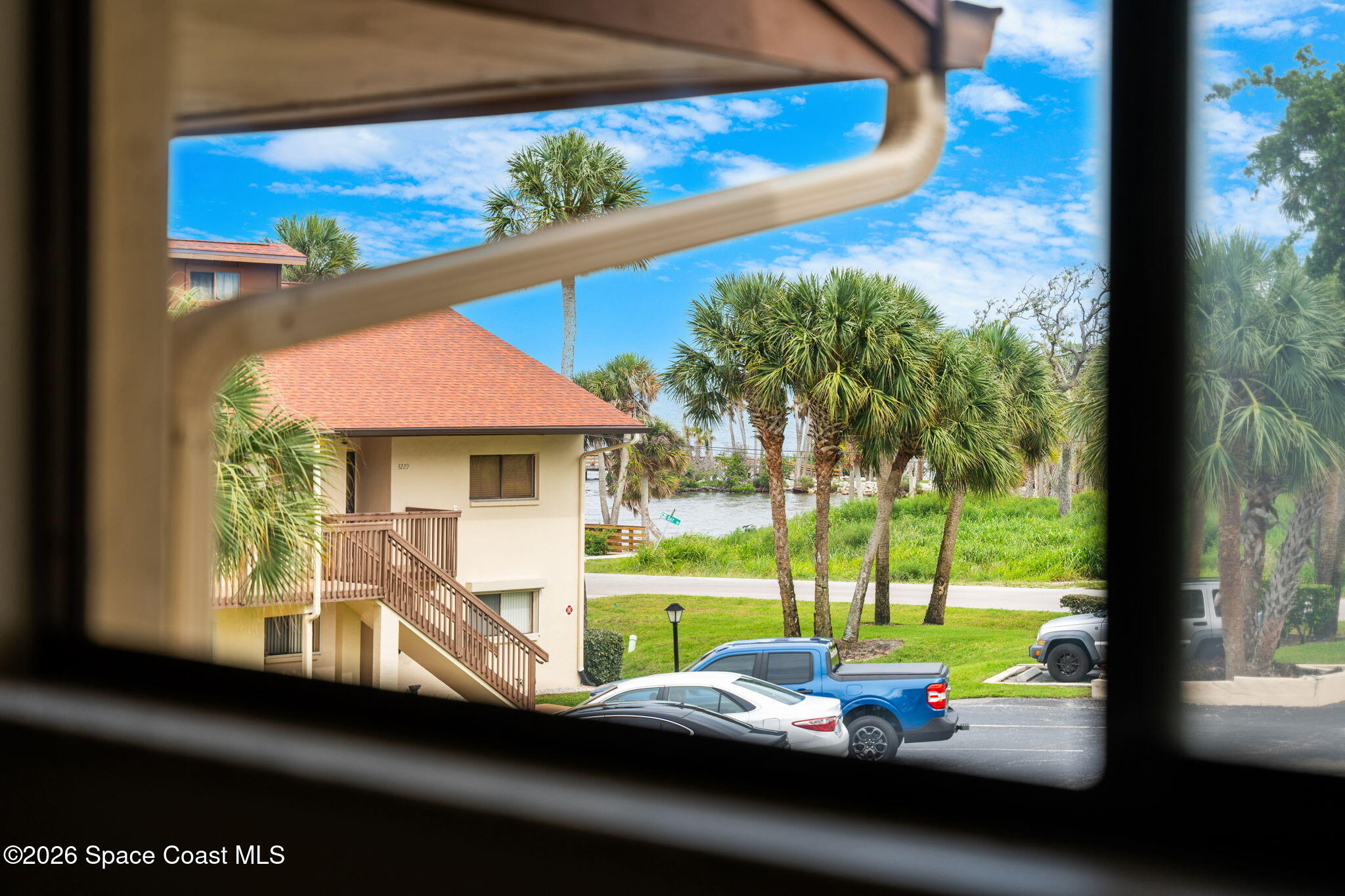 3121 Kirkland Road Northeast Palm Bay, FL 32905 - Photo 27 of 52 a view of a patio with chair and table