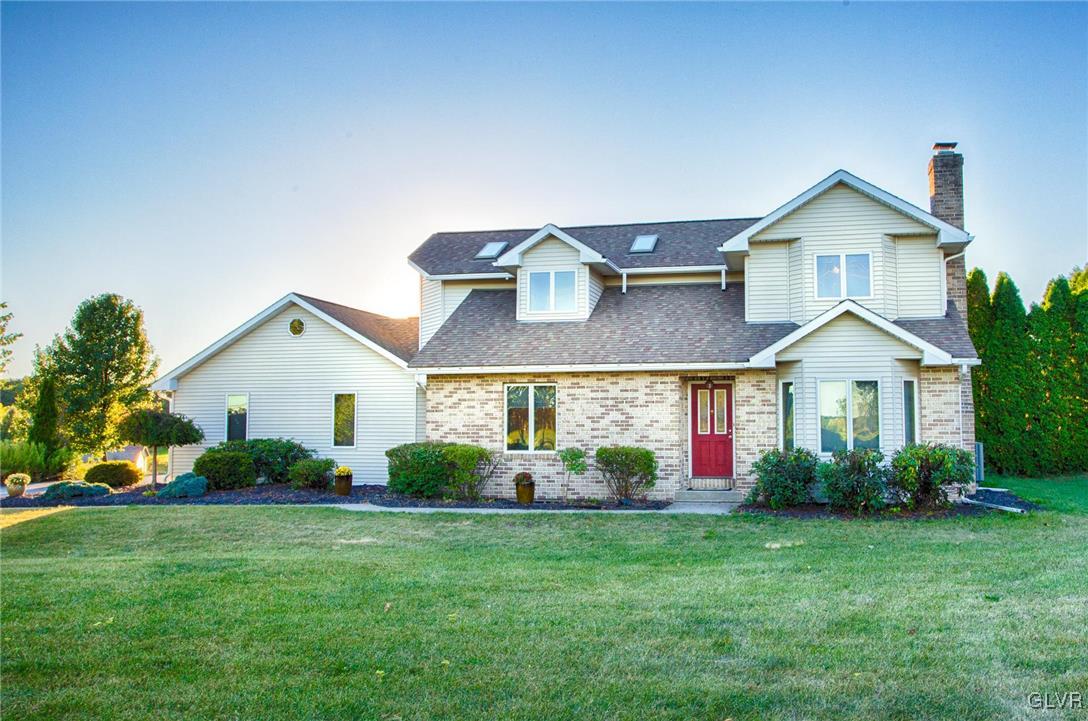 455 Bauer Road Bath, PA 18014 - Photo 1 of 26 a front view of house with yard and green space