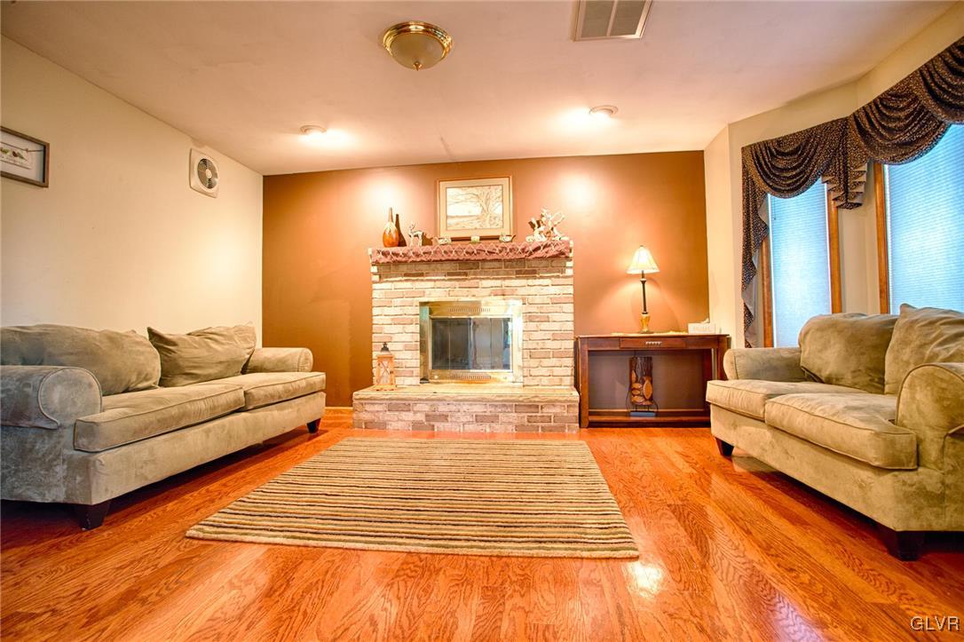 455 Bauer Road Bath, PA 18014 - Photo 2 of 26 a living room with furniture and a fireplace