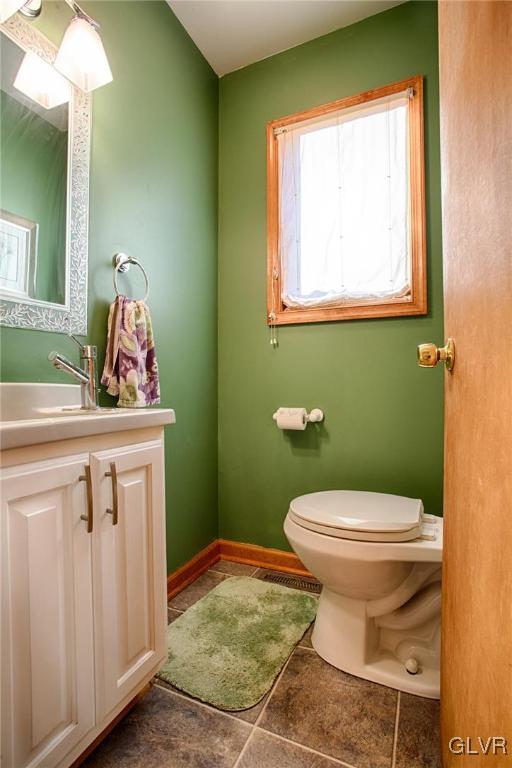 455 Bauer Road Bath, PA 18014 - Photo 7 of 26 a bathroom with a toilet sink and mirror
