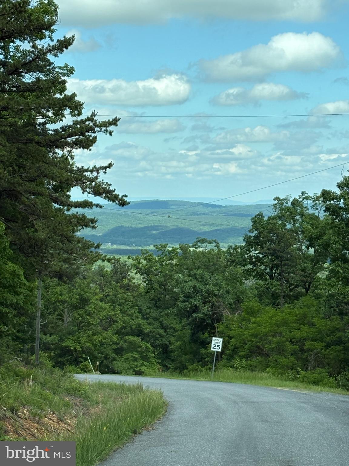 Lot 353 Hawk Trail Winchester, VA 22602 - Photo 12 of 12 a backyard of a house with lots of green space