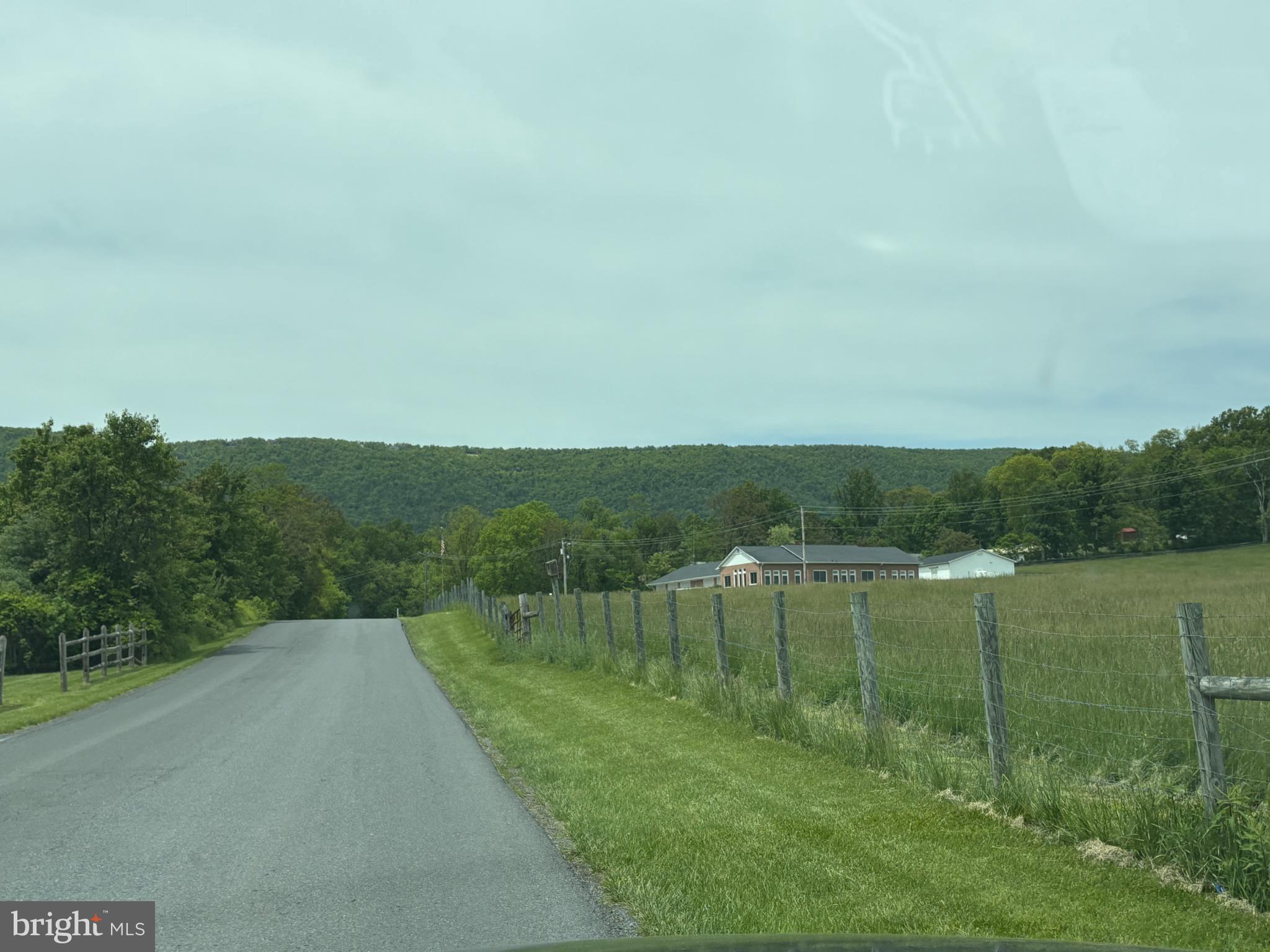 Lot 353 Hawk Trail Winchester, VA 22602 - Photo 3 of 12 a view of a lake with a yard