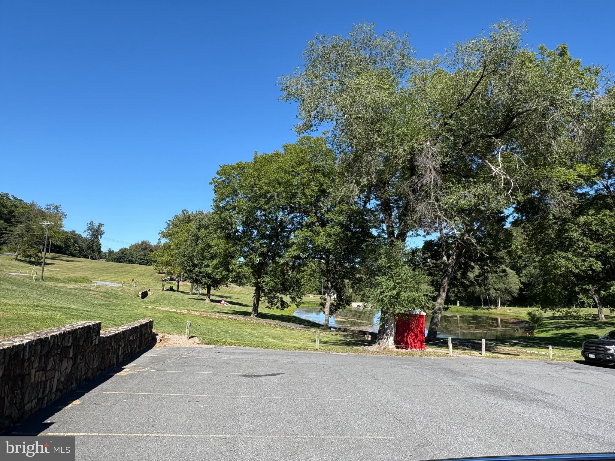Lot 353 Hawk Trail Winchester, VA 22602 - Photo 4 of 12 a view of a park with large trees and plants