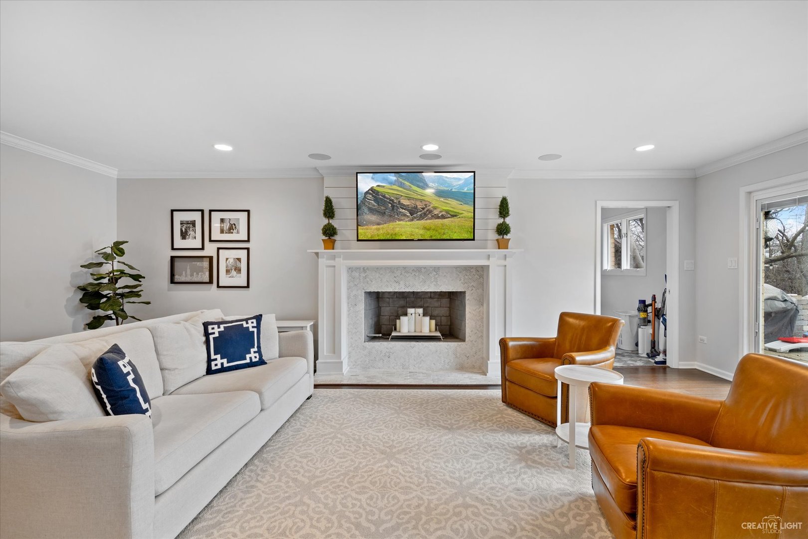 734 Forest Glen Lane Oak Brook, IL 60523 - Photo 12 of 36 a living room with furniture and a fireplace