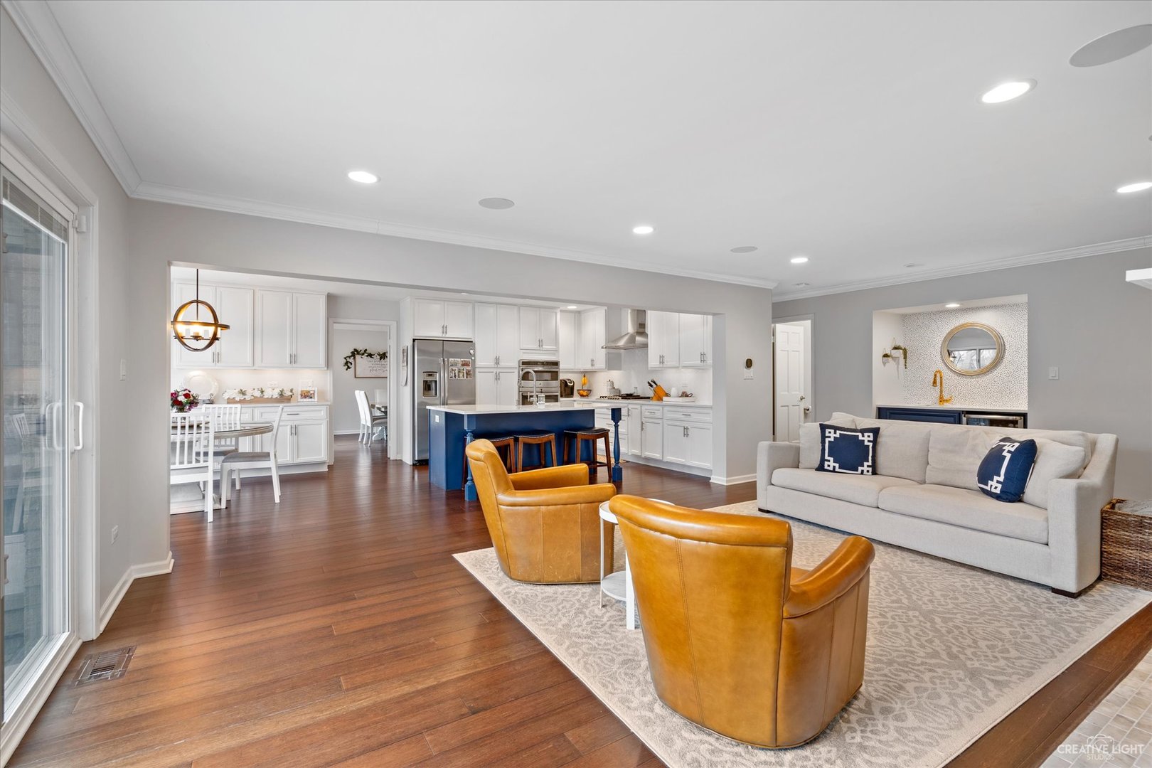 734 Forest Glen Lane Oak Brook, IL 60523 - Photo 15 of 36 a living room with furniture and wooden floor