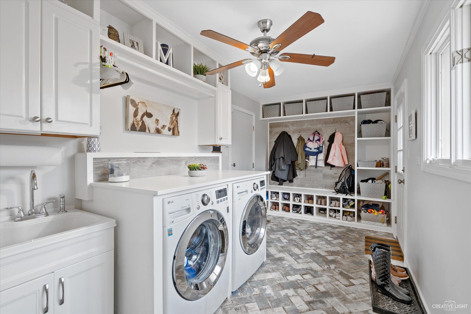 734 Forest Glen Lane Oak Brook, IL 60523 - Photo 22 of 36 a view of a storage & utility room with washer and dryer