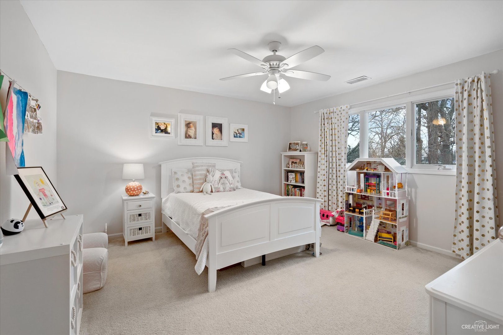 734 Forest Glen Lane Oak Brook, IL 60523 - Photo 26 of 36 a bedroom with a bed and a chandelier