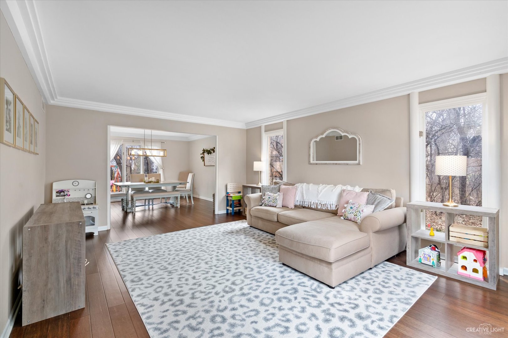734 Forest Glen Lane Oak Brook, IL 60523 - Photo 3 of 36 a living room with furniture and a couch
