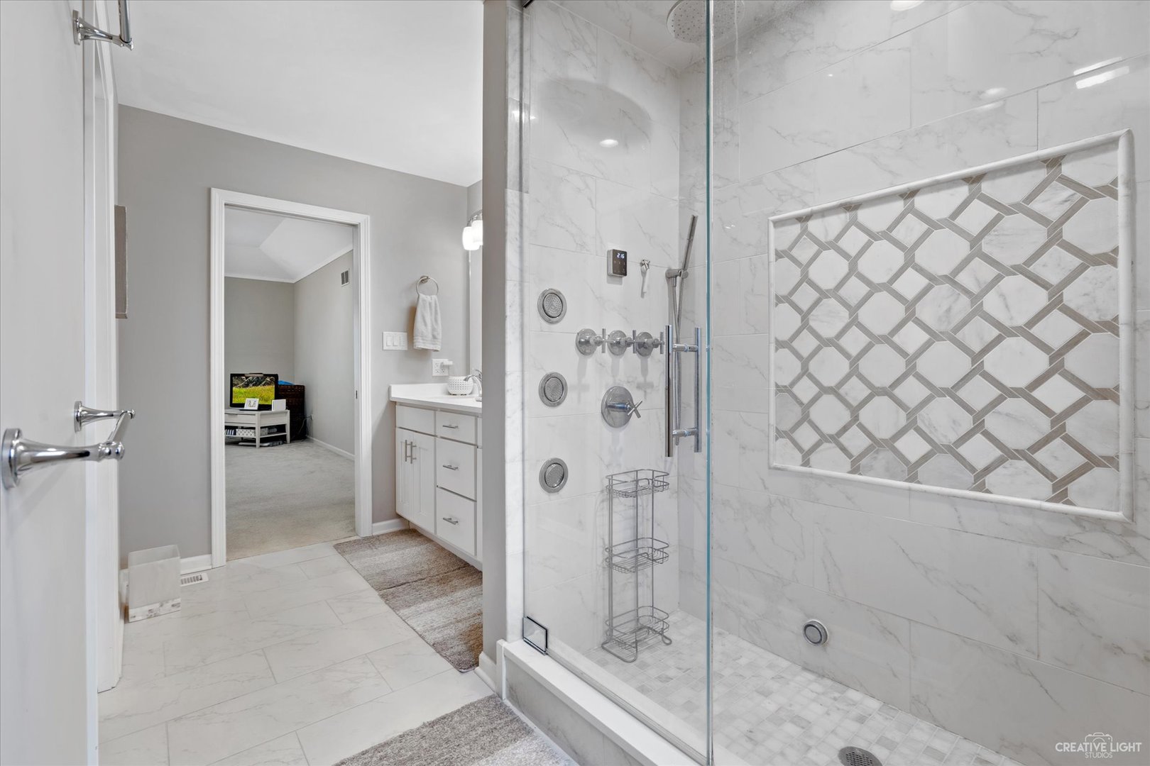 734 Forest Glen Lane Oak Brook, IL 60523 - Photo 31 of 36 a bathroom with a glass shower door