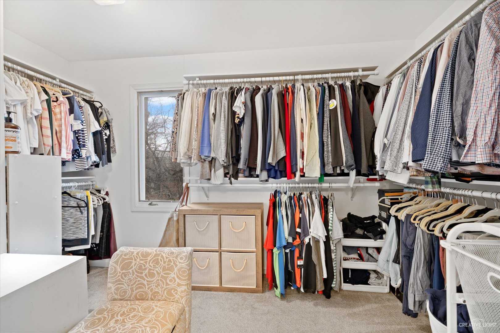 734 Forest Glen Lane Oak Brook, IL 60523 - Photo 32 of 36 a view of walk in closet with clothes and shoes