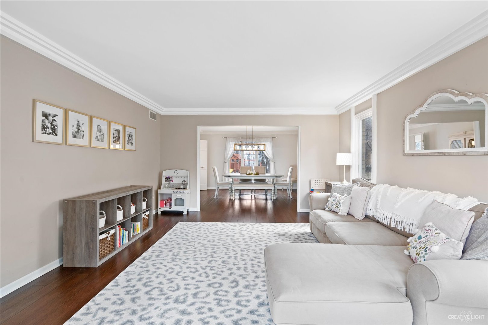 734 Forest Glen Lane Oak Brook, IL 60523 - Photo 5 of 36 a living room with furniture and a wooden floor
