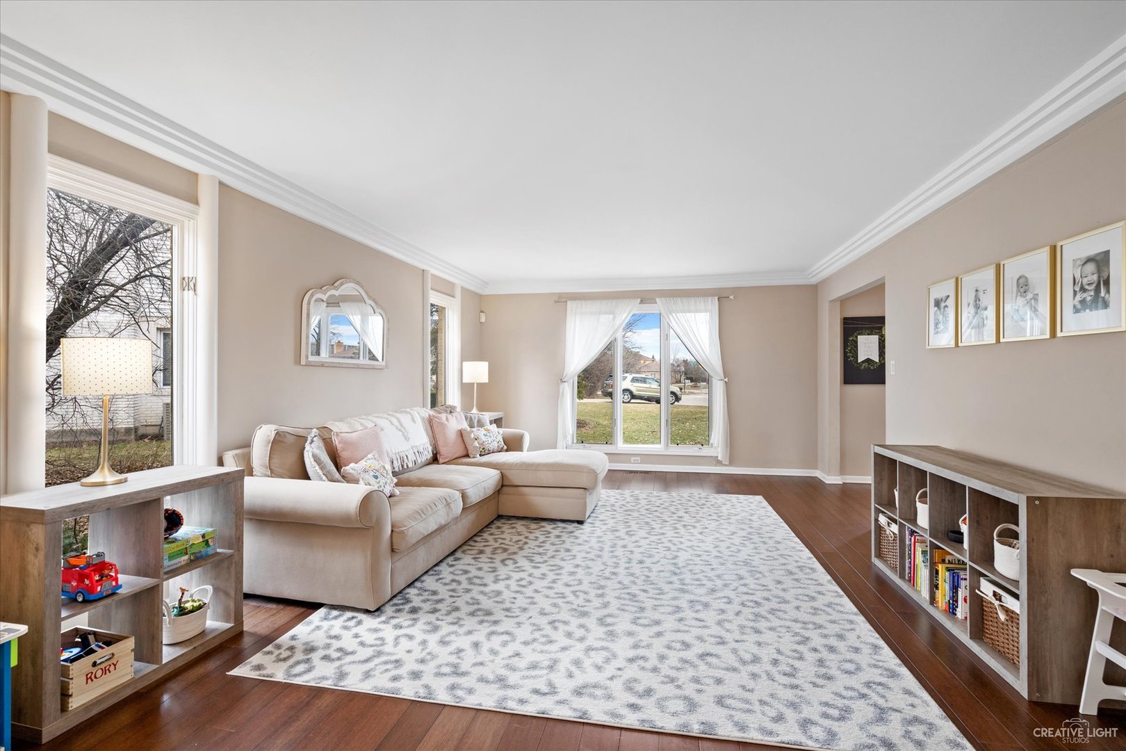 734 Forest Glen Lane Oak Brook, IL 60523 - Photo 6 of 36 a living room with furniture and a window