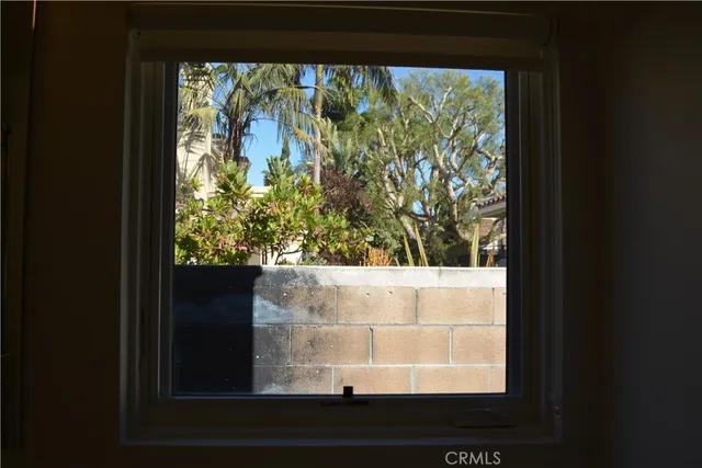 a view of a house with a tree