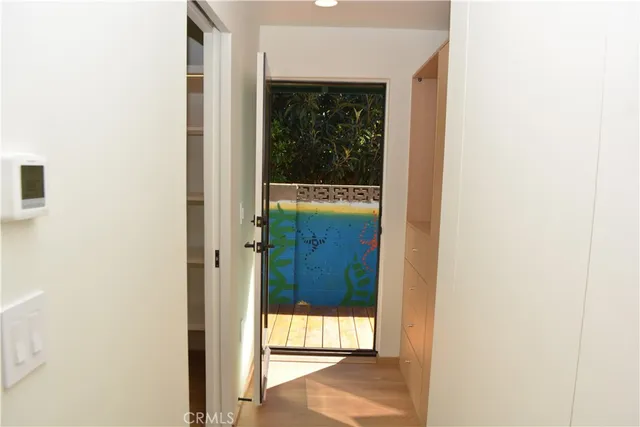 a view of a house with a tree