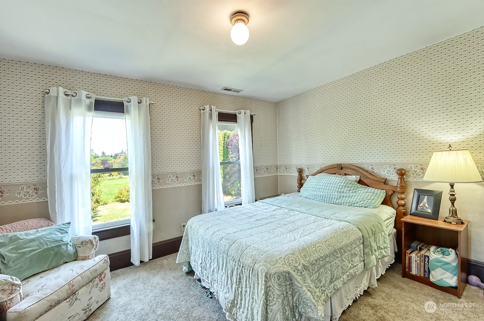 3315 South Pass Road Everson, WA 98247 - Photo 8 of 40 a spacious bedroom with a bed and a window