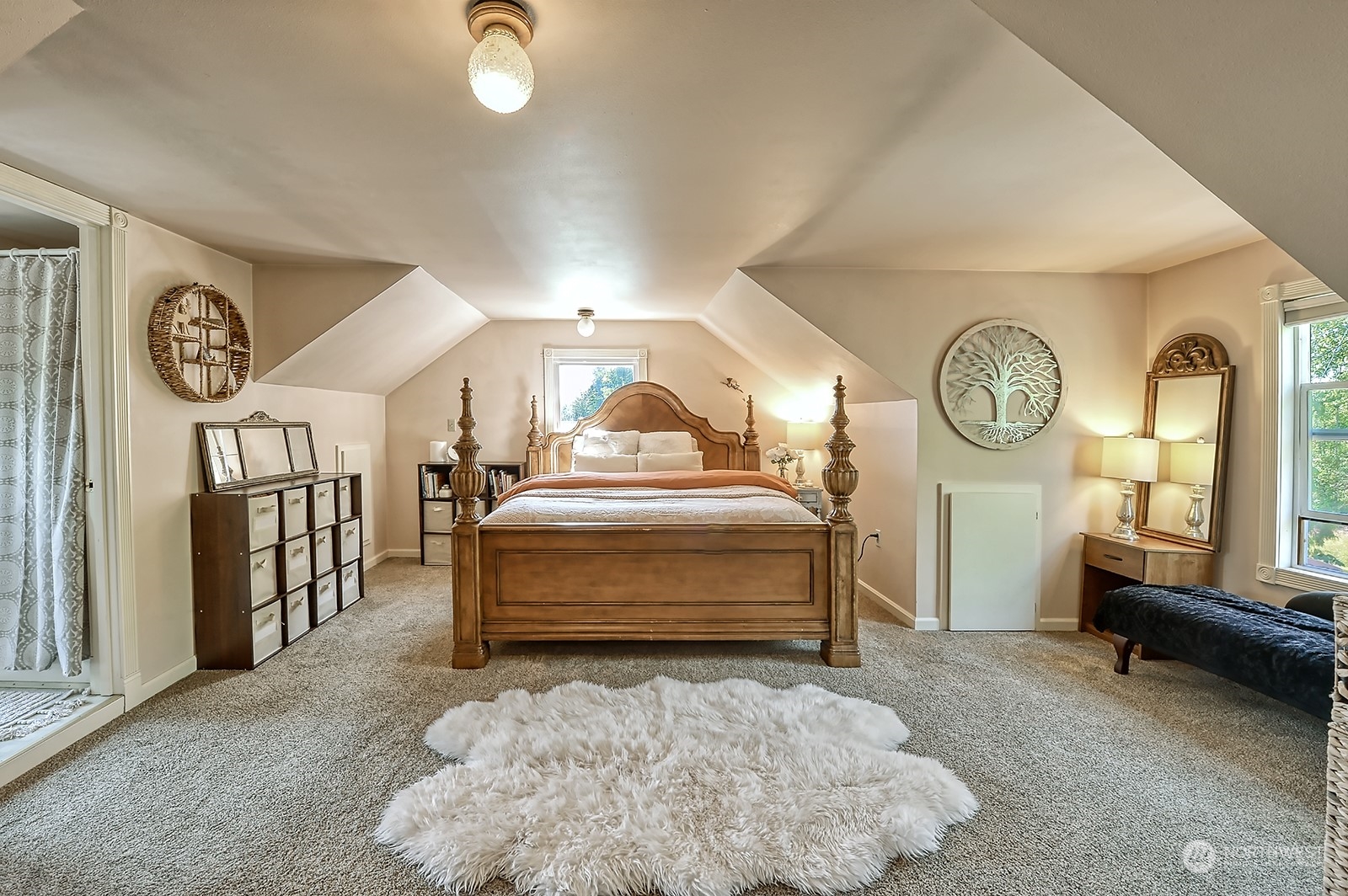 3315 South Pass Road Everson, WA 98247 - Photo 10 of 40 a spacious bedroom with a bed and a chandelier