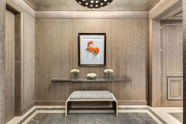 a room with a table and chairs