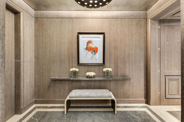 a room with a table and chairs