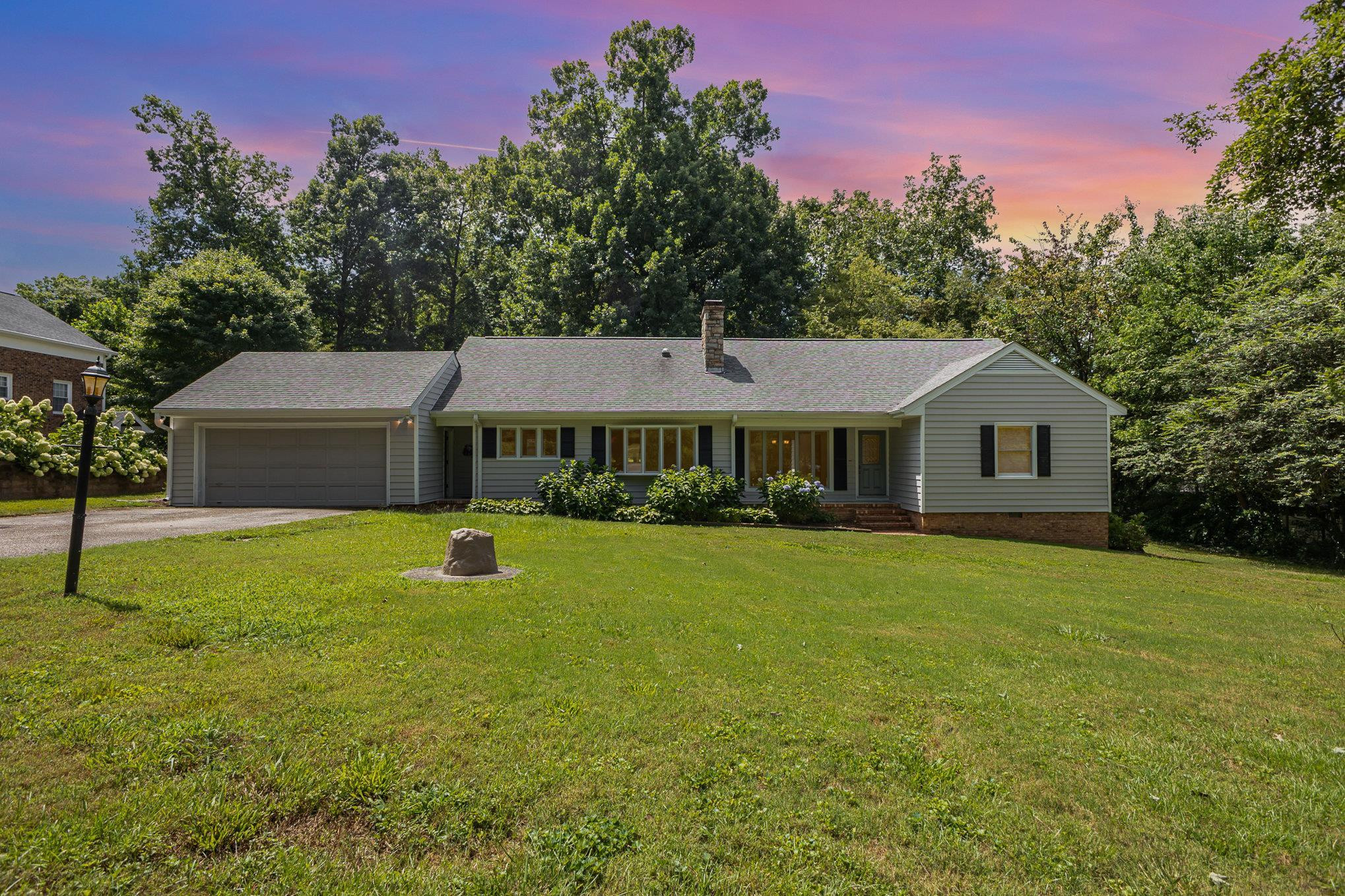 3210 Timberlake Road Raleigh, NC 27604 - Photo 1 of 43 a front view of a house with a garden