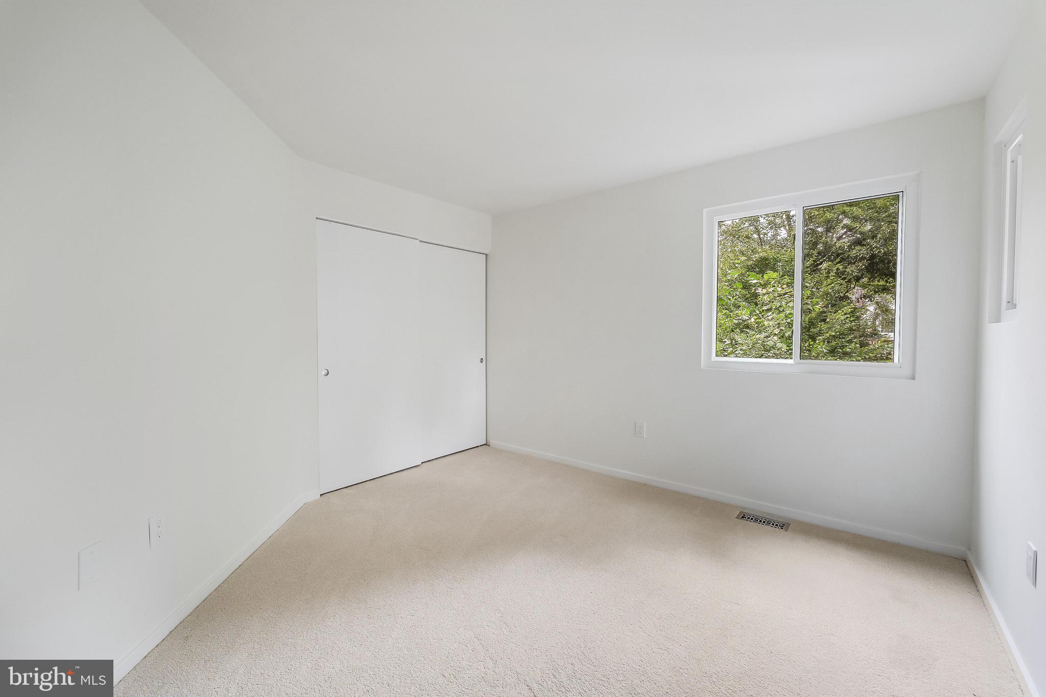11916 Moss Point Lane Reston, VA 20194 - Photo 13 of 43 an empty room with a window