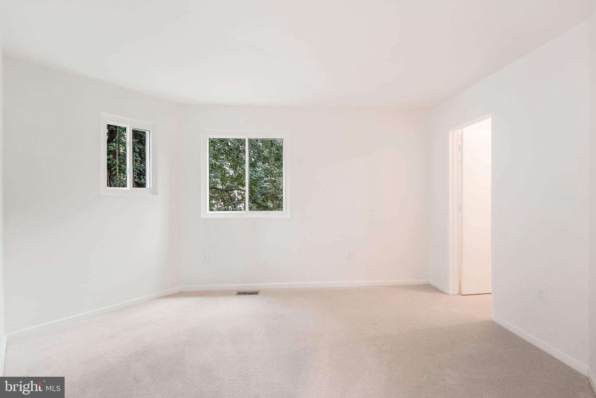 11916 Moss Point Lane Reston, VA 20194 - Photo 16 of 43 an empty room with a window