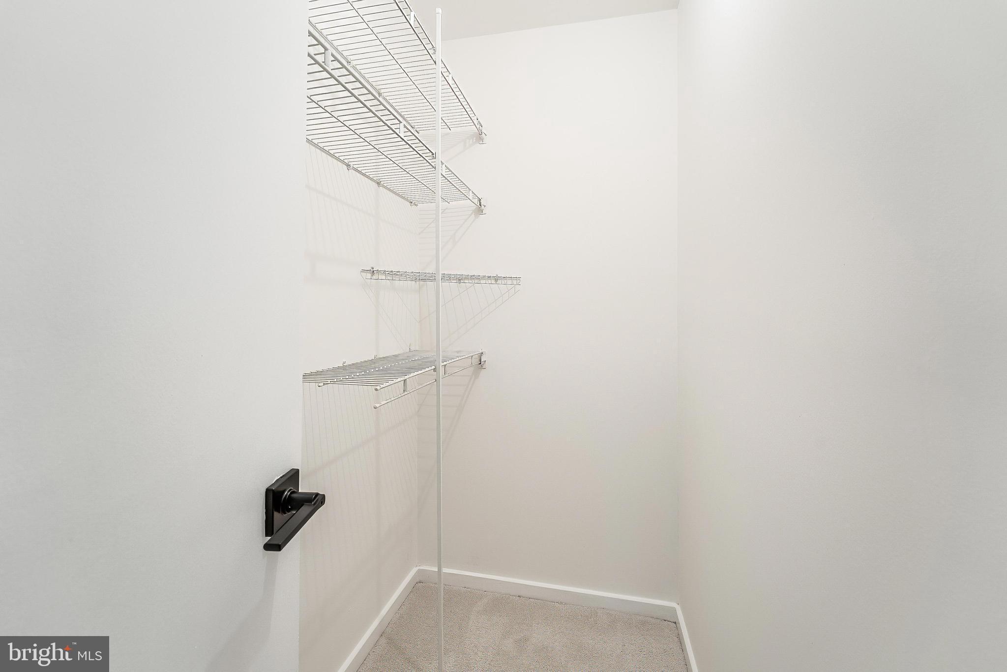 11916 Moss Point Lane Reston, VA 20194 - Photo 18 of 43 a view of small space with racks on the wall