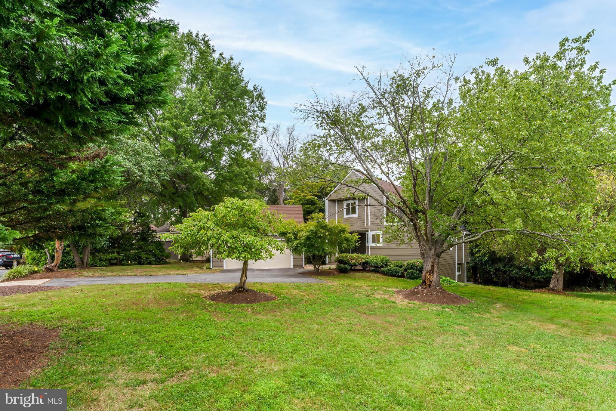 11916 Moss Point Lane Reston, VA 20194 - Photo 2 of 43 a view of a park with large trees