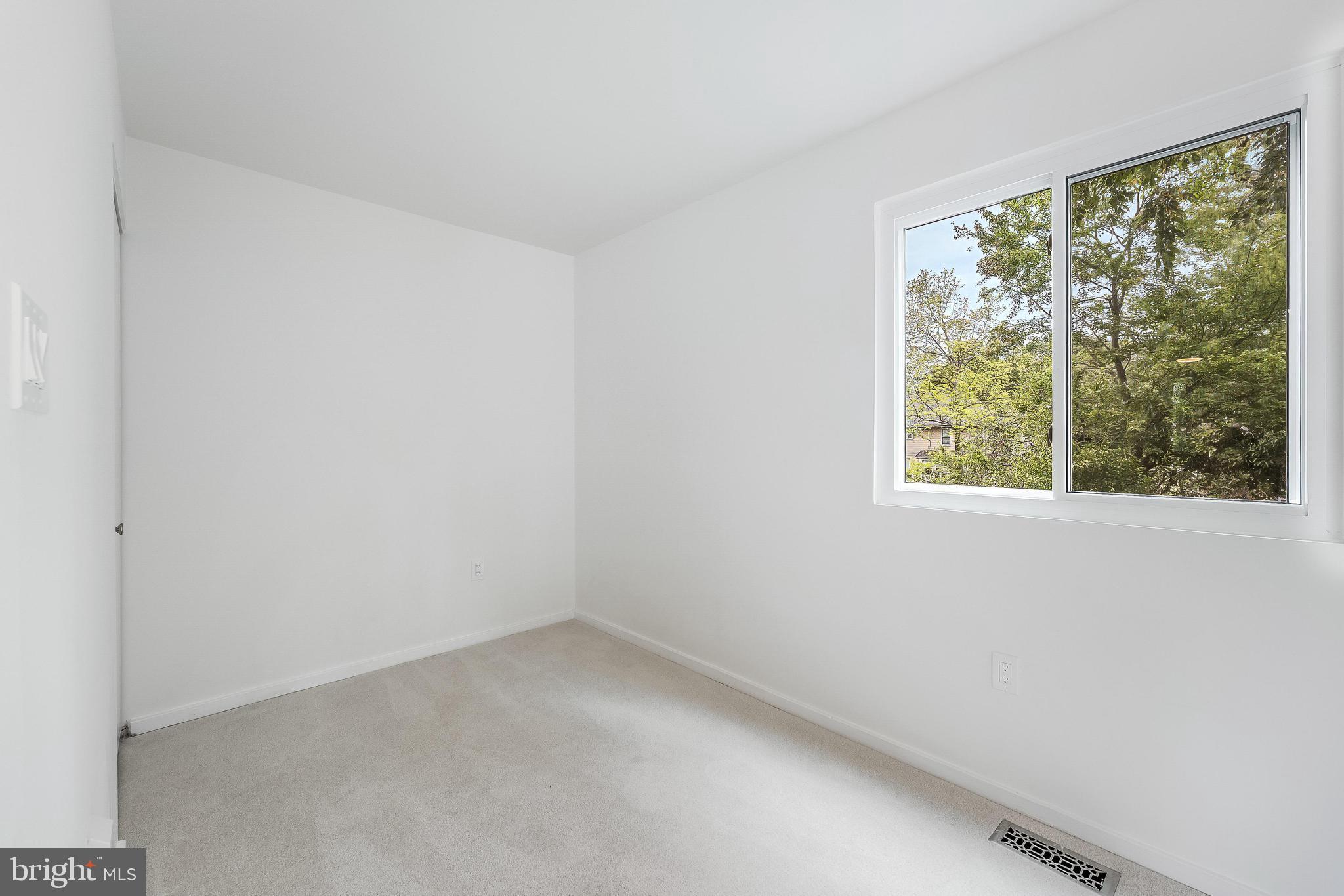 11916 Moss Point Lane Reston, VA 20194 - Photo 29 of 43 an empty room with a window