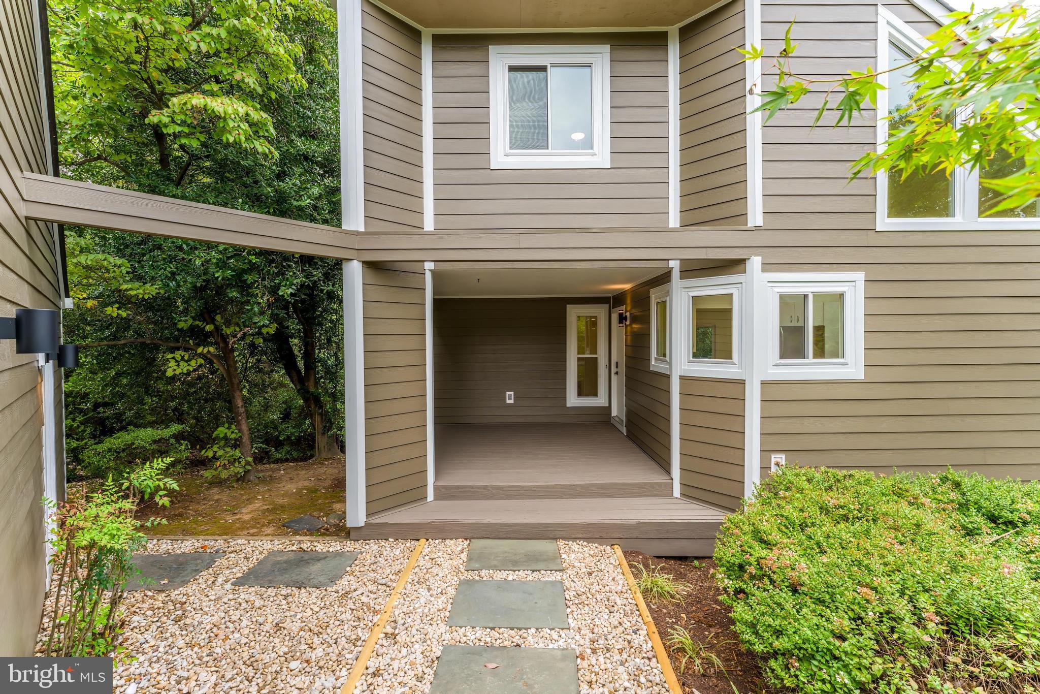 11916 Moss Point Lane Reston, VA 20194 - Photo 3 of 43 a view of a entrance with house