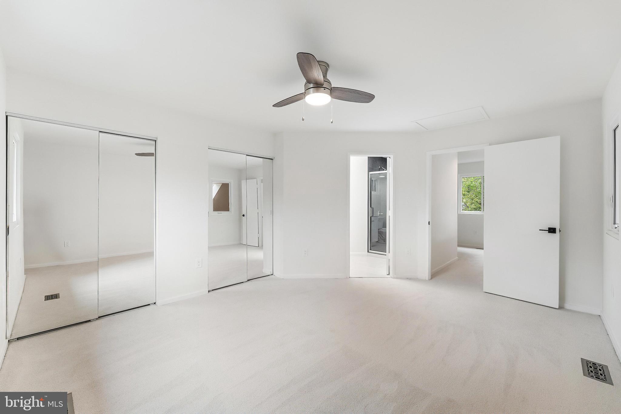 11916 Moss Point Lane Reston, VA 20194 - Photo 31 of 43 a view of empty room with wooden floor and ceiling fan