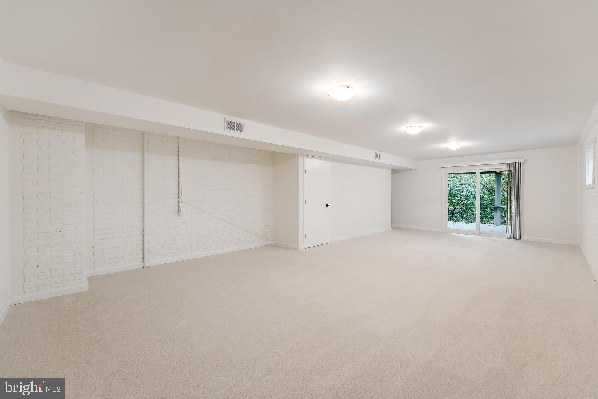 11916 Moss Point Lane Reston, VA 20194 - Photo 37 of 43 a view of an empty room with a window