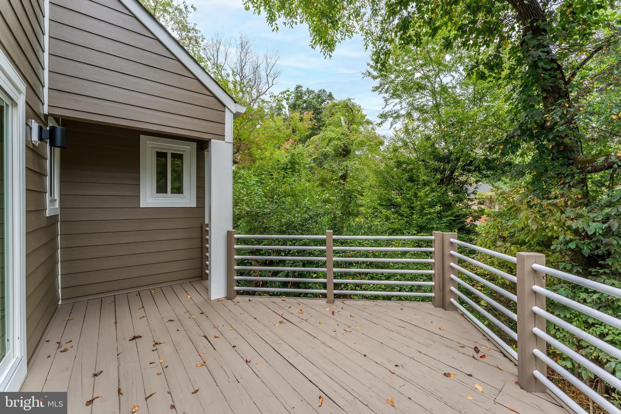 11916 Moss Point Lane Reston, VA 20194 - Photo 42 of 43 a view of outdoor space with deck and trees