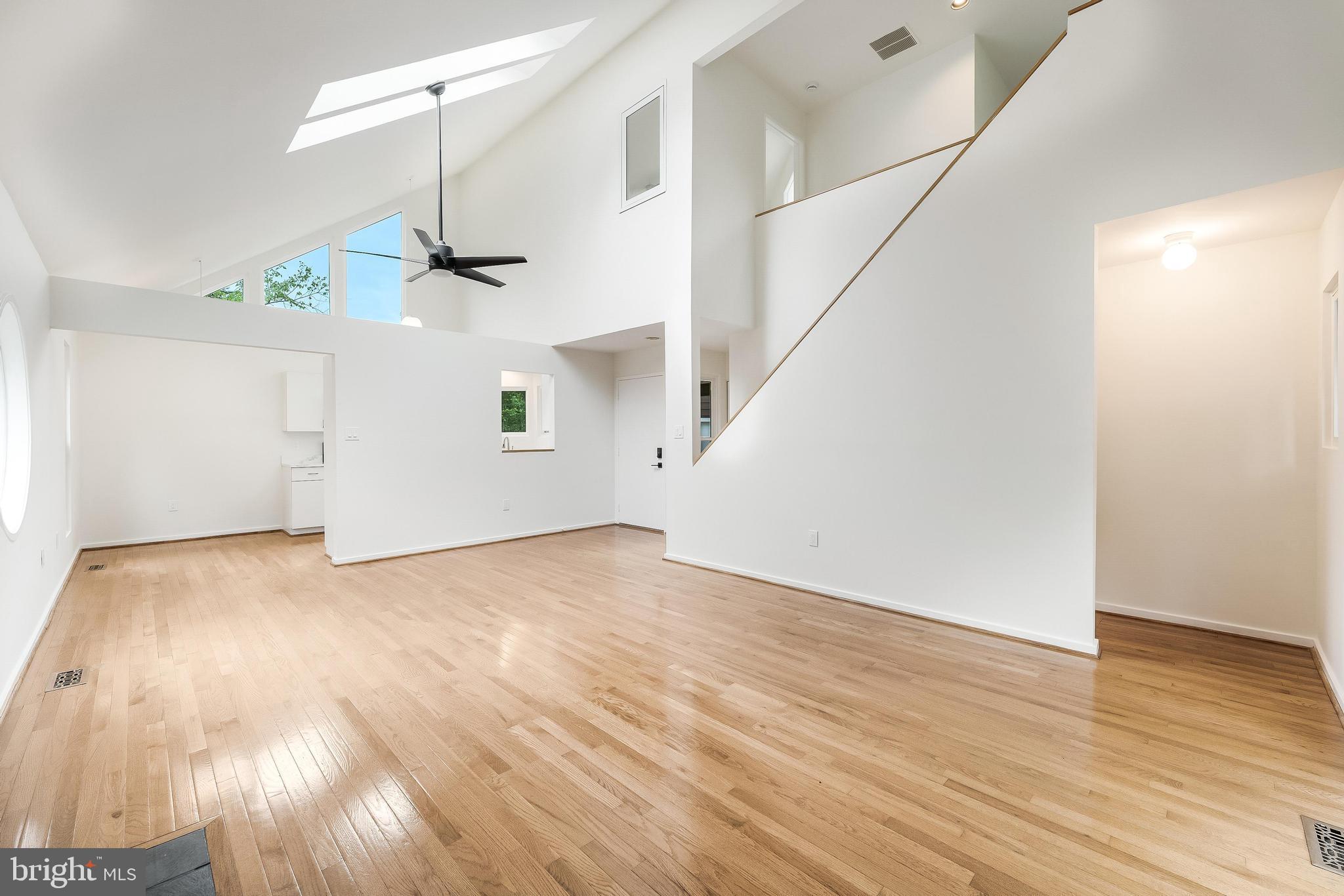 11916 Moss Point Lane Reston, VA 20194 - Photo 8 of 43 a view of an empty room with wooden floor