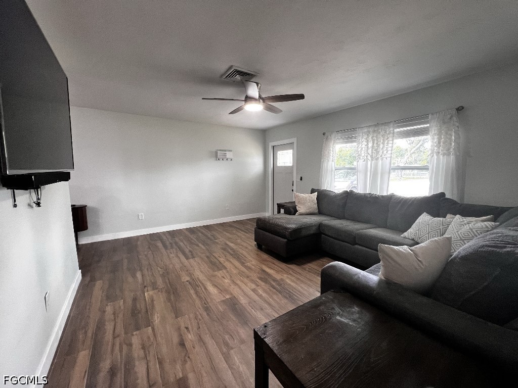 144 Whidden Road North Fort Myers, FL 33917 - Photo 7 of 16 a living room with furniture and a flat screen tv