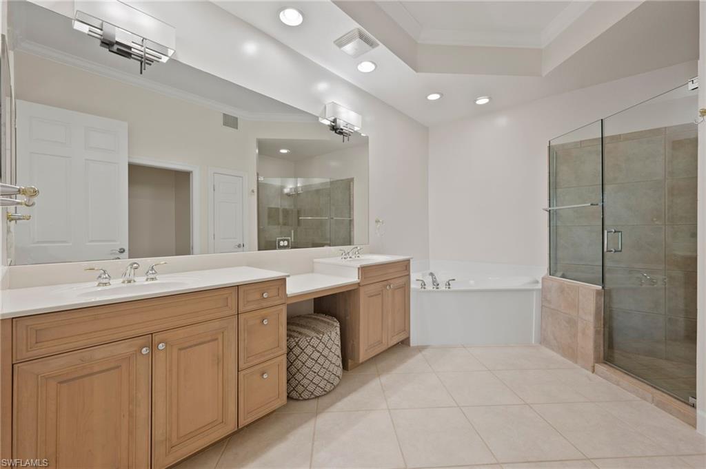 23700 Merano Court, Unit 101 Estero, FL 34134 - Photo 10 of 27 Primary Bathroom