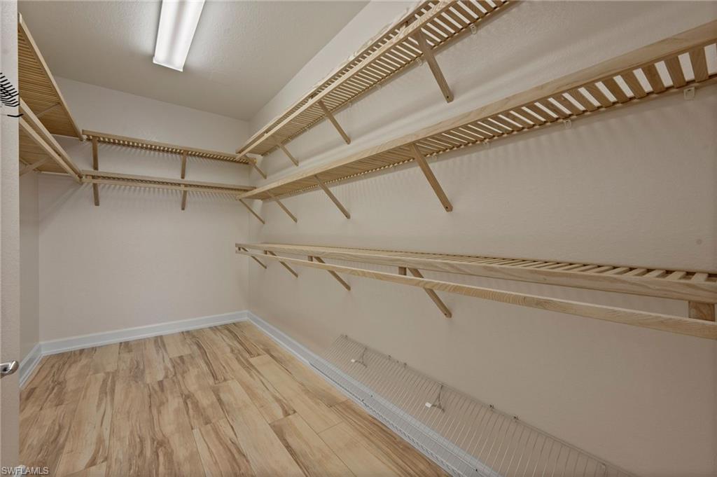 23700 Merano Court, Unit 101 Estero, FL 34134 - Photo 11 of 27 Primary Closet
