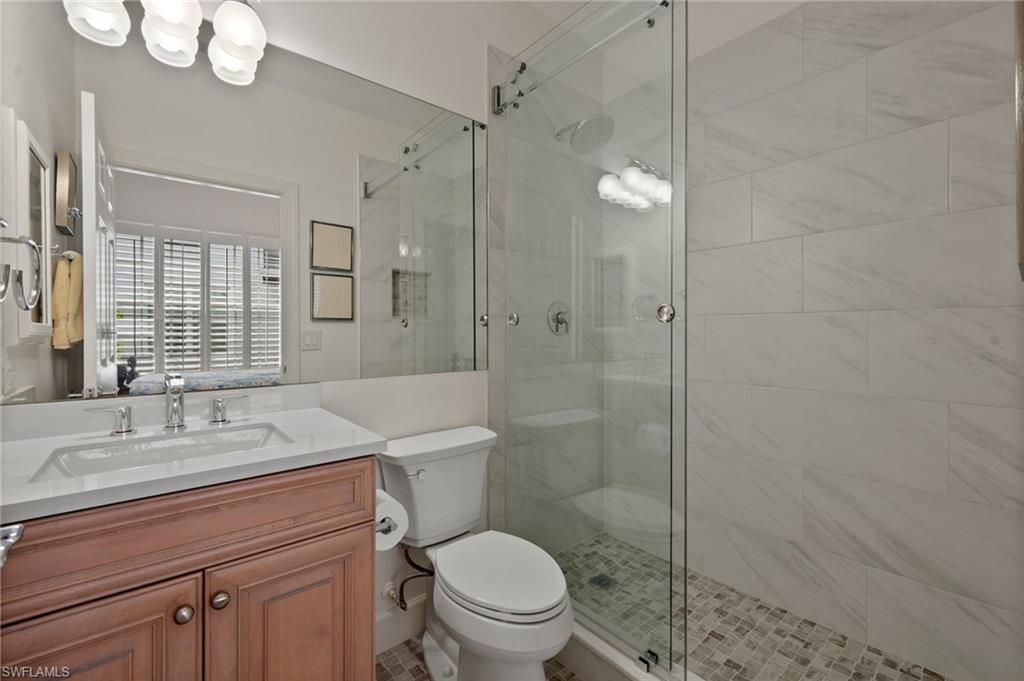23700 Merano Court, Unit 101 Estero, FL 34134 - Photo 13 of 27 En-Suite Guest Bathroom 2