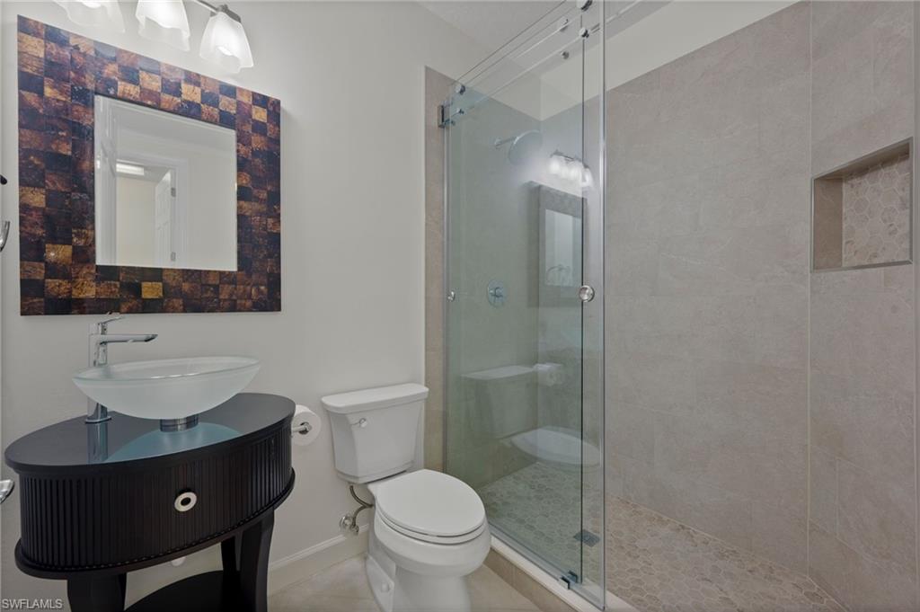 23700 Merano Court, Unit 101 Estero, FL 34134 - Photo 15 of 27 Guest Bathroom 3