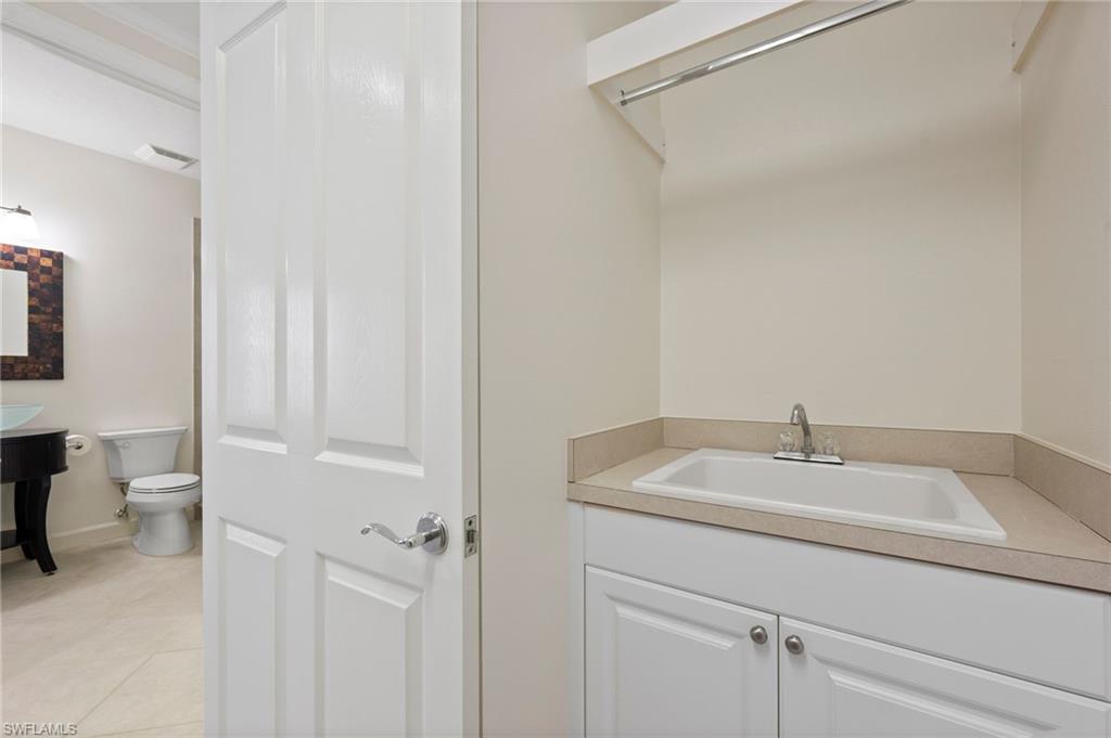 23700 Merano Court, Unit 101 Estero, FL 34134 - Photo 17 of 27 Laundry Room
