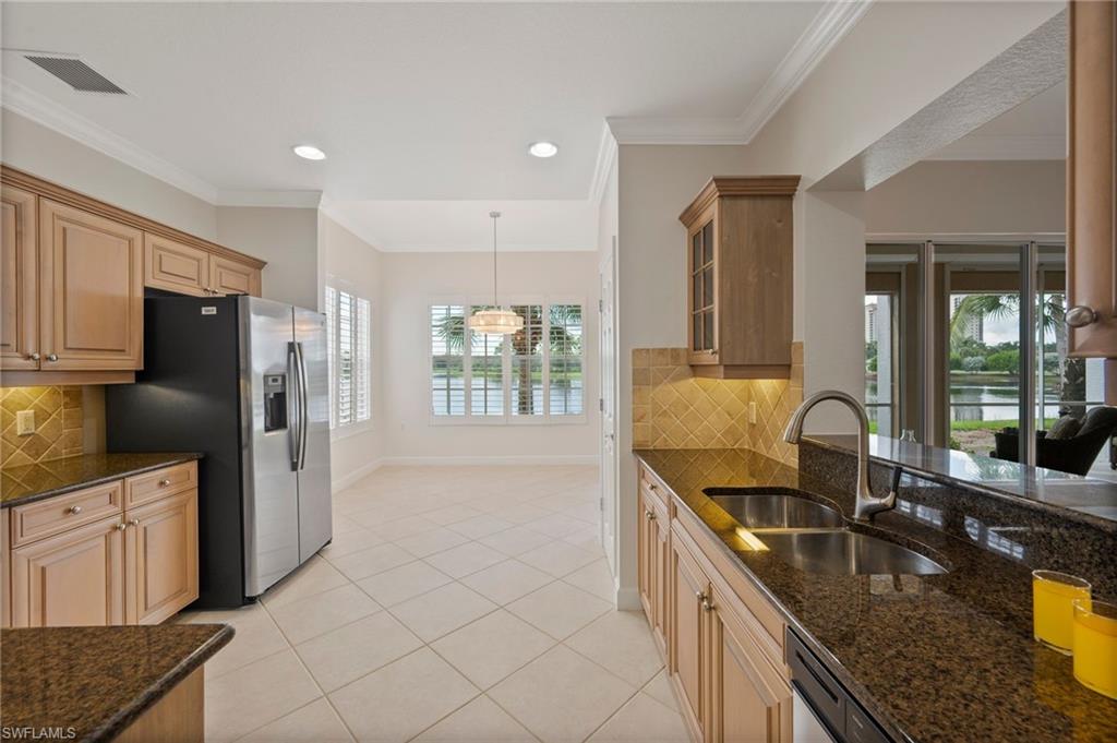 23700 Merano Court, Unit 101 Estero, FL 34134 - Photo 5 of 27 Kitchen & Morning Room