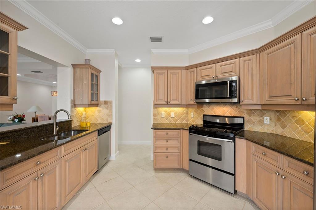 23700 Merano Court, Unit 101 Estero, FL 34134 - Photo 6 of 27 Kitchen